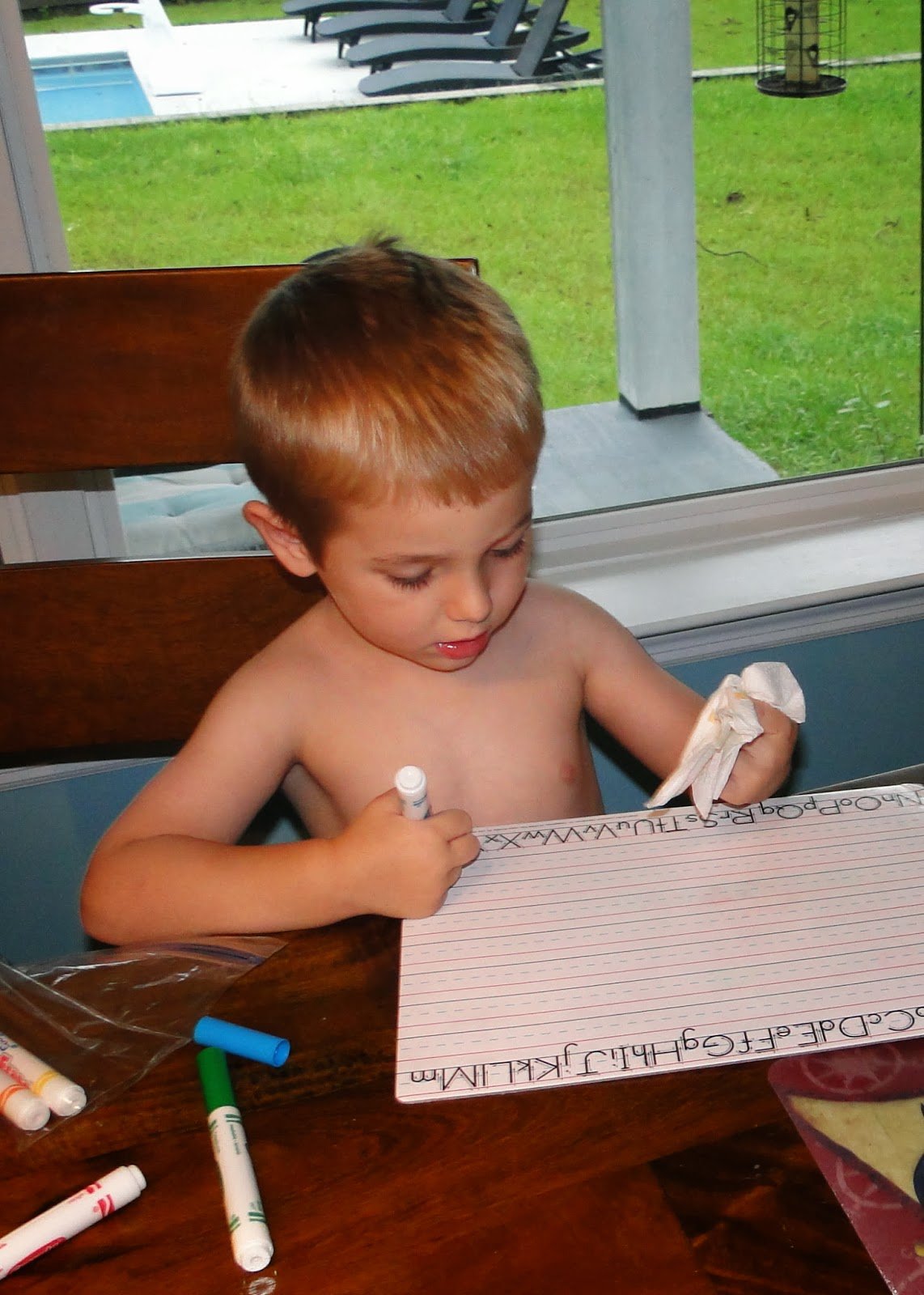 boy practicing writing