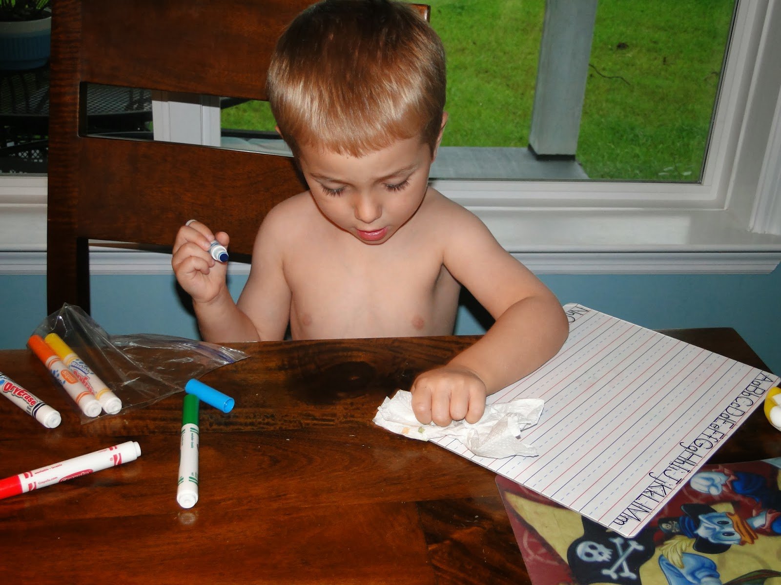 boy practicing writing