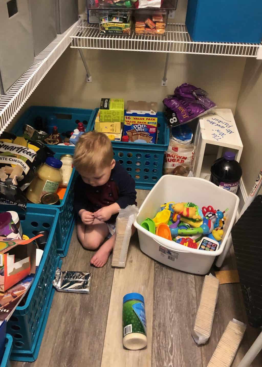 toddler in pantry