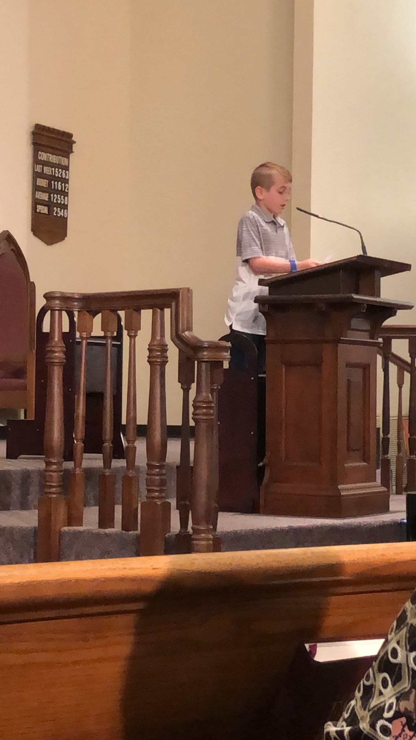 Kye speaking at church