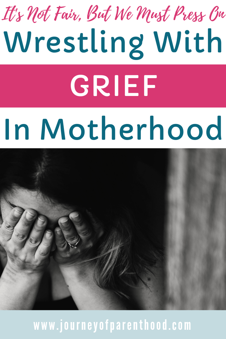 pinable image: woman crying "wrestling with grief in motherhood"