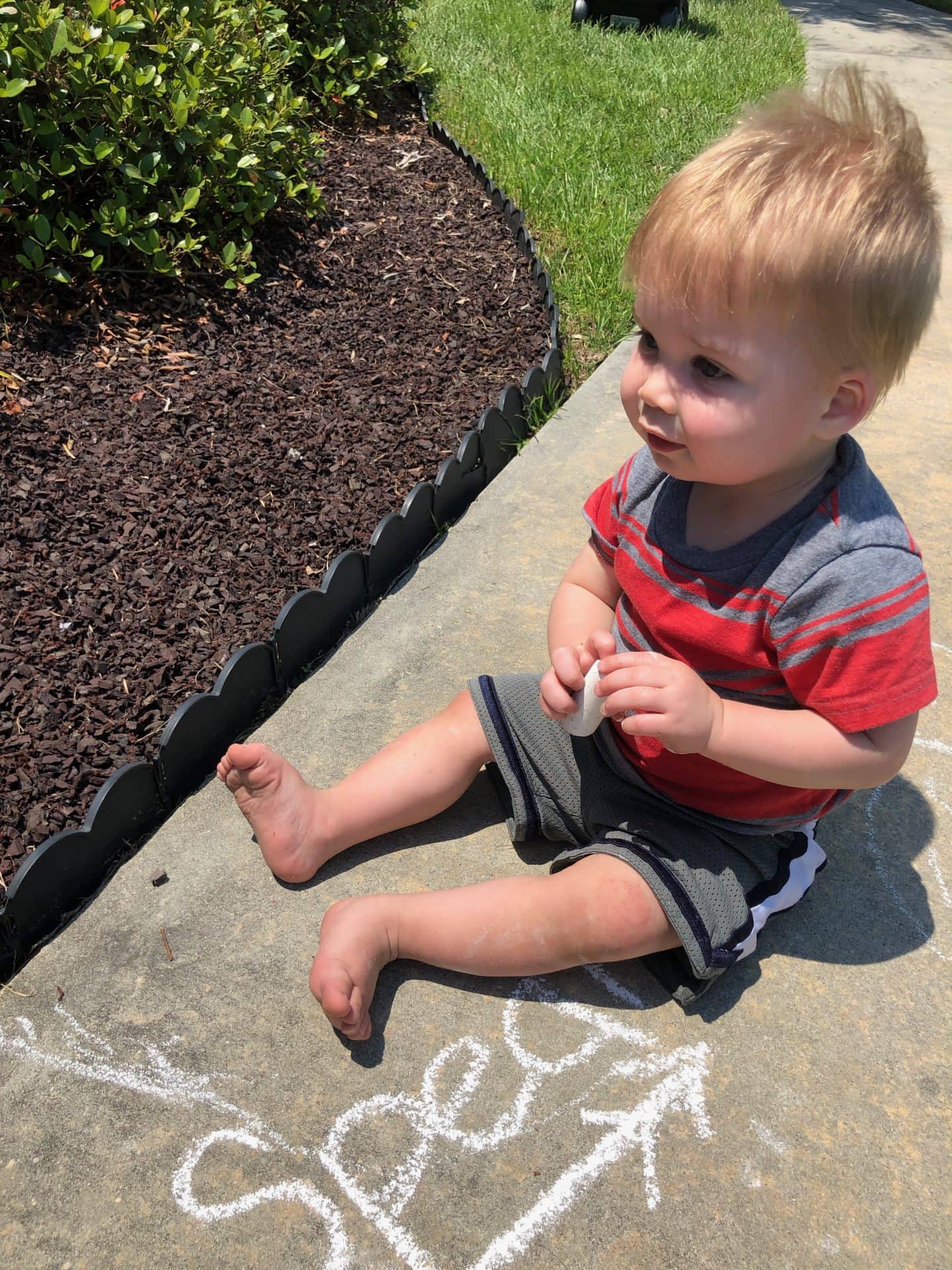 toddler drawing chalk