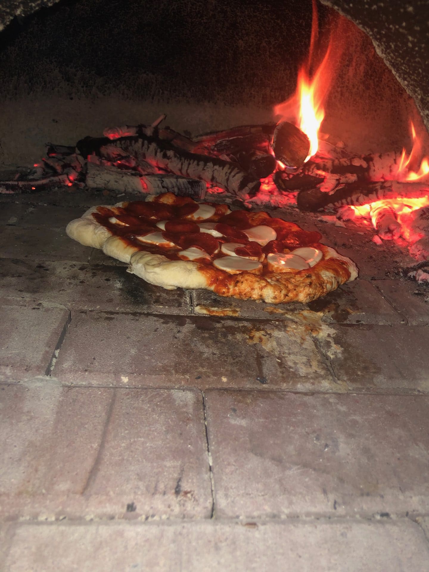 outdoor pizza oven and pool