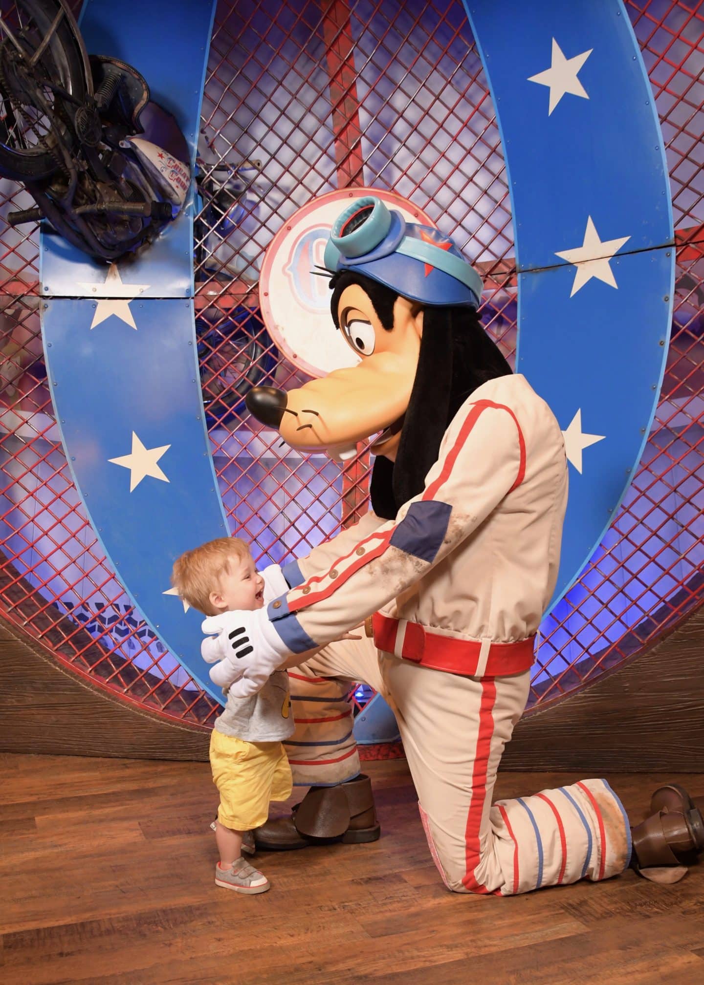 toddler boy with goofy at magic kingdom Disney World