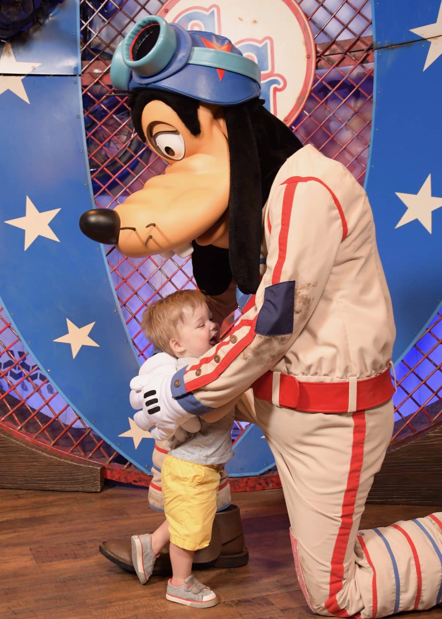toddler boy with goofy at magic kingdom Disney World