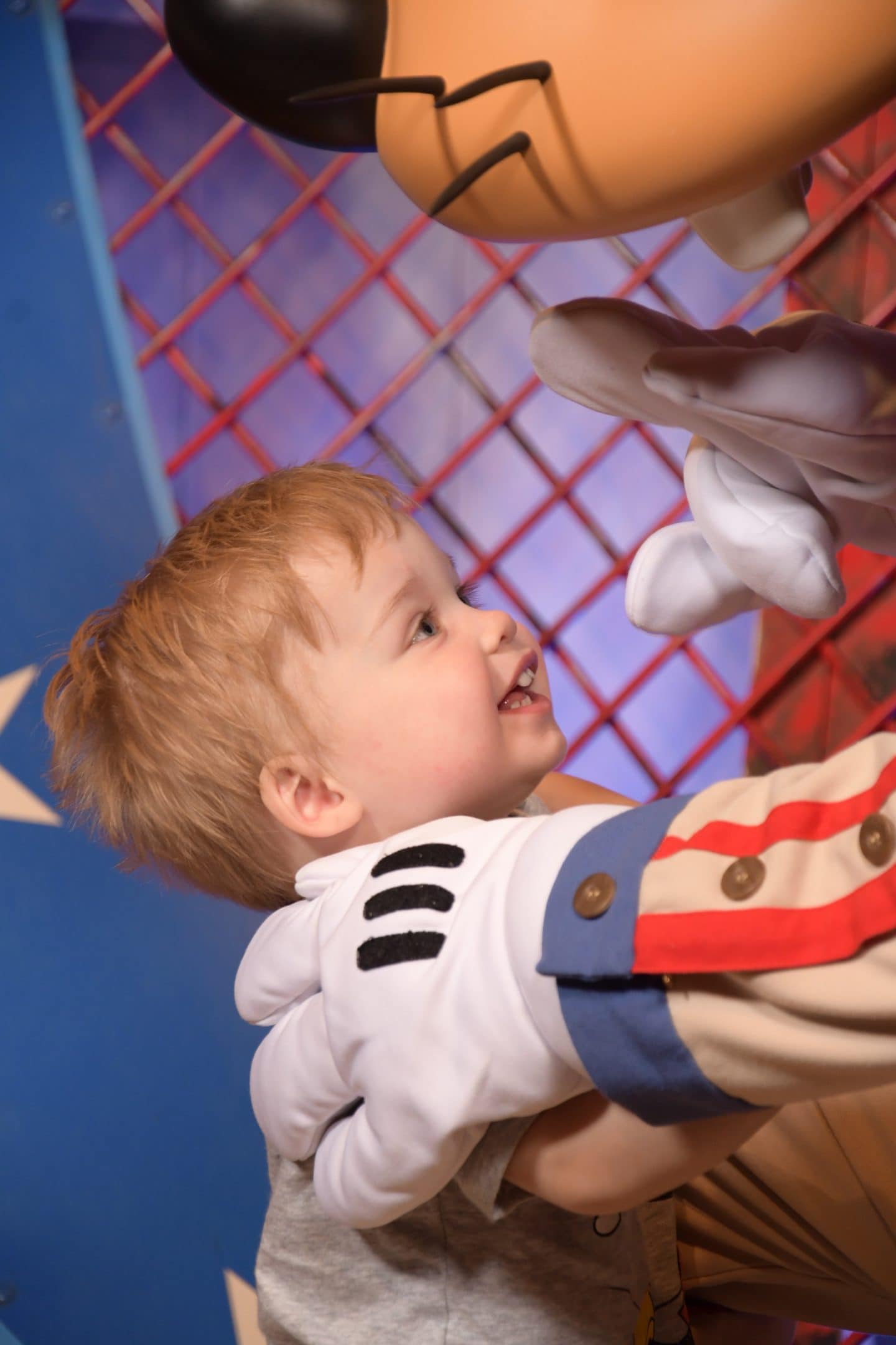 toddler boy with goofy at magic kingdom Disney World