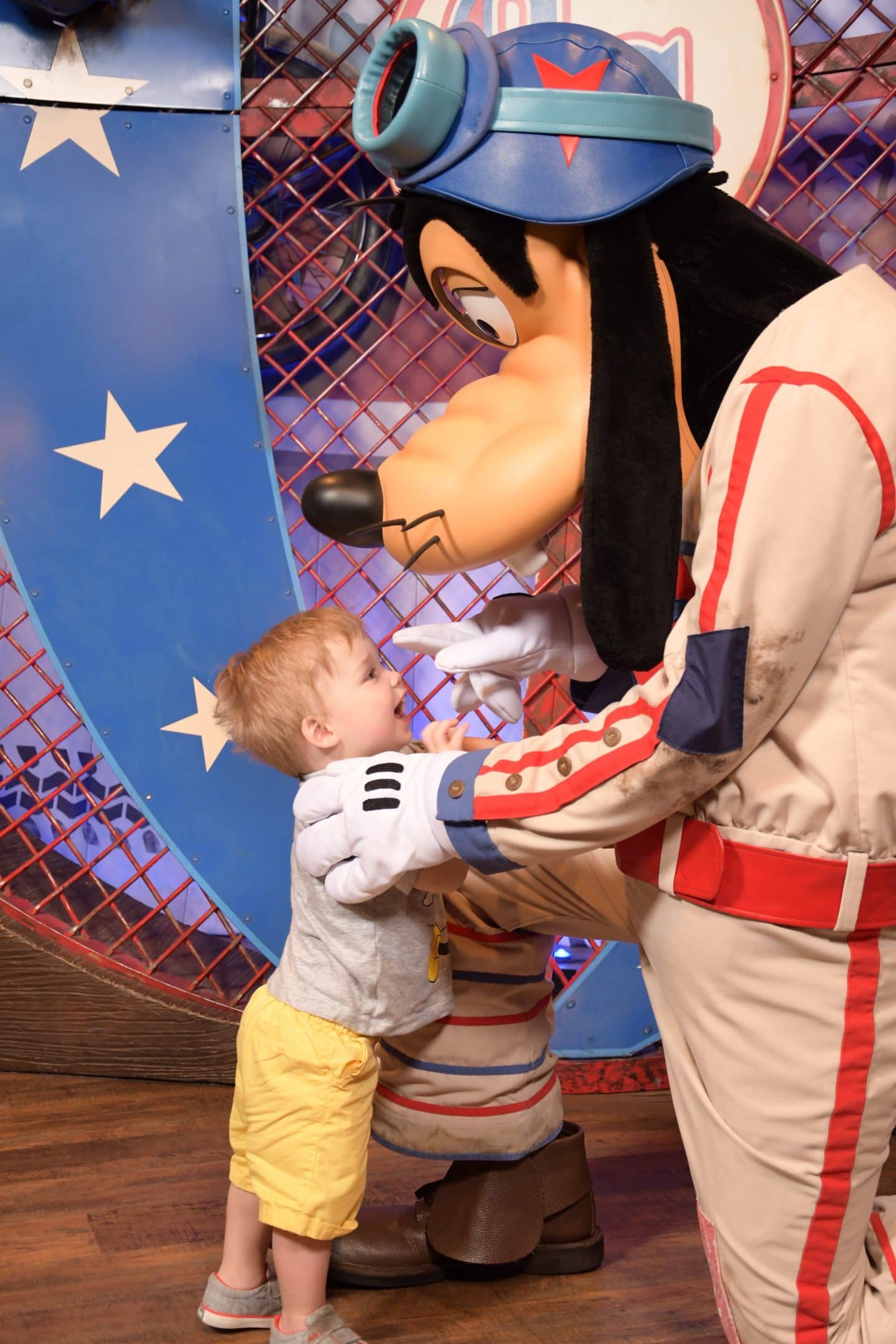 toddler boy with goofy at magic kingdom Disney World