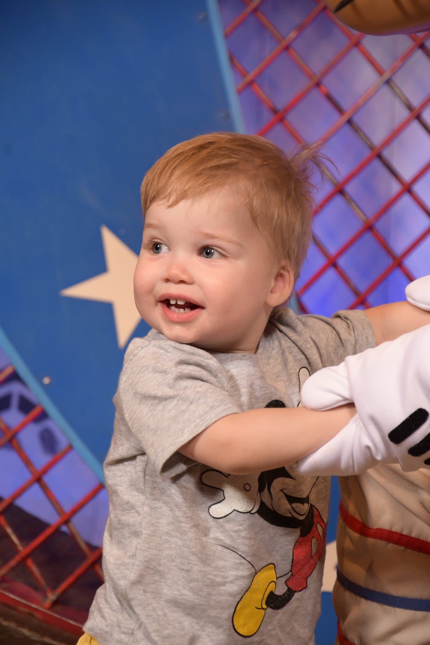 toddler boy with goofy at magic kingdom Disney World