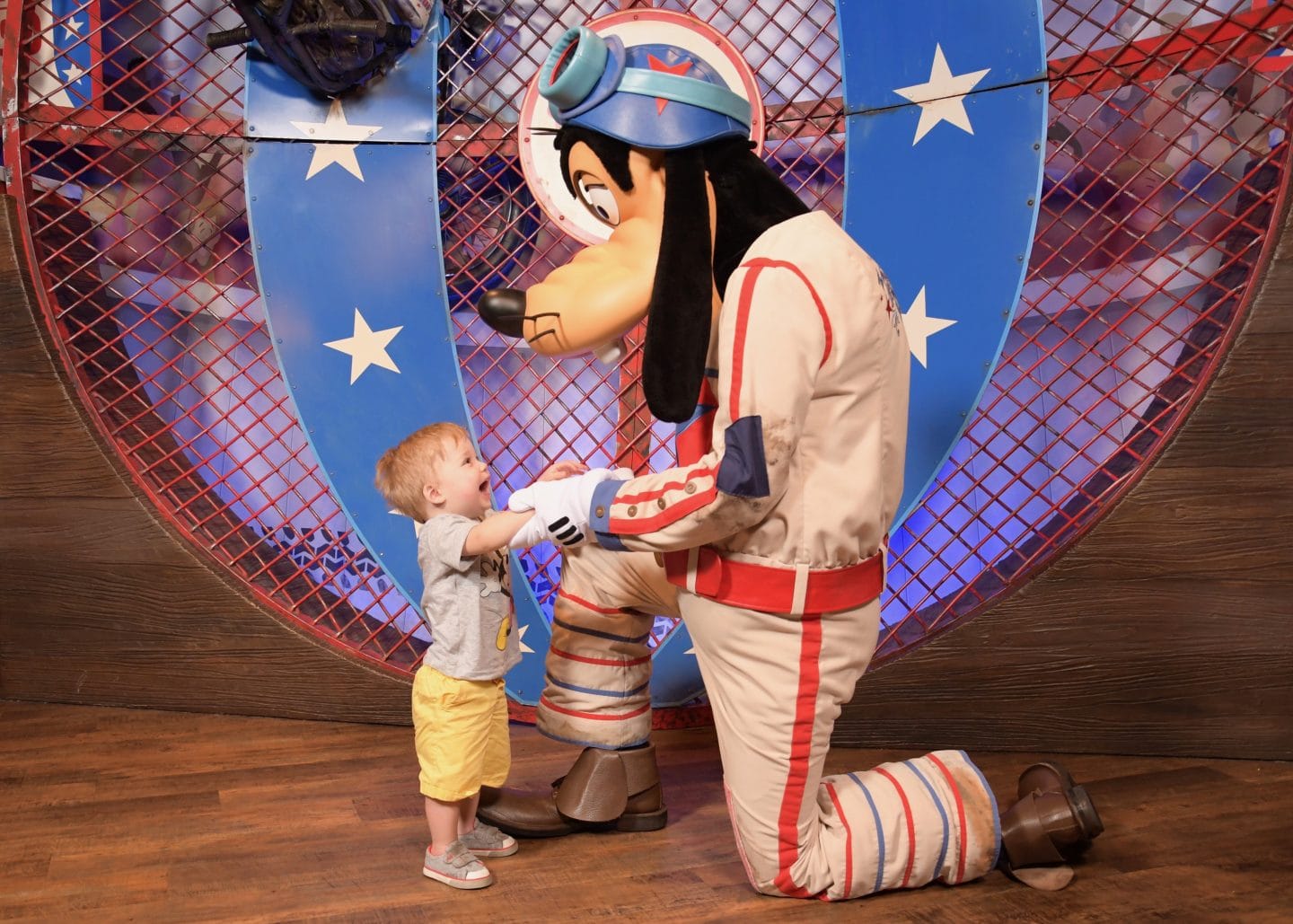 toddler boy with goofy at magic kingdom Disney World