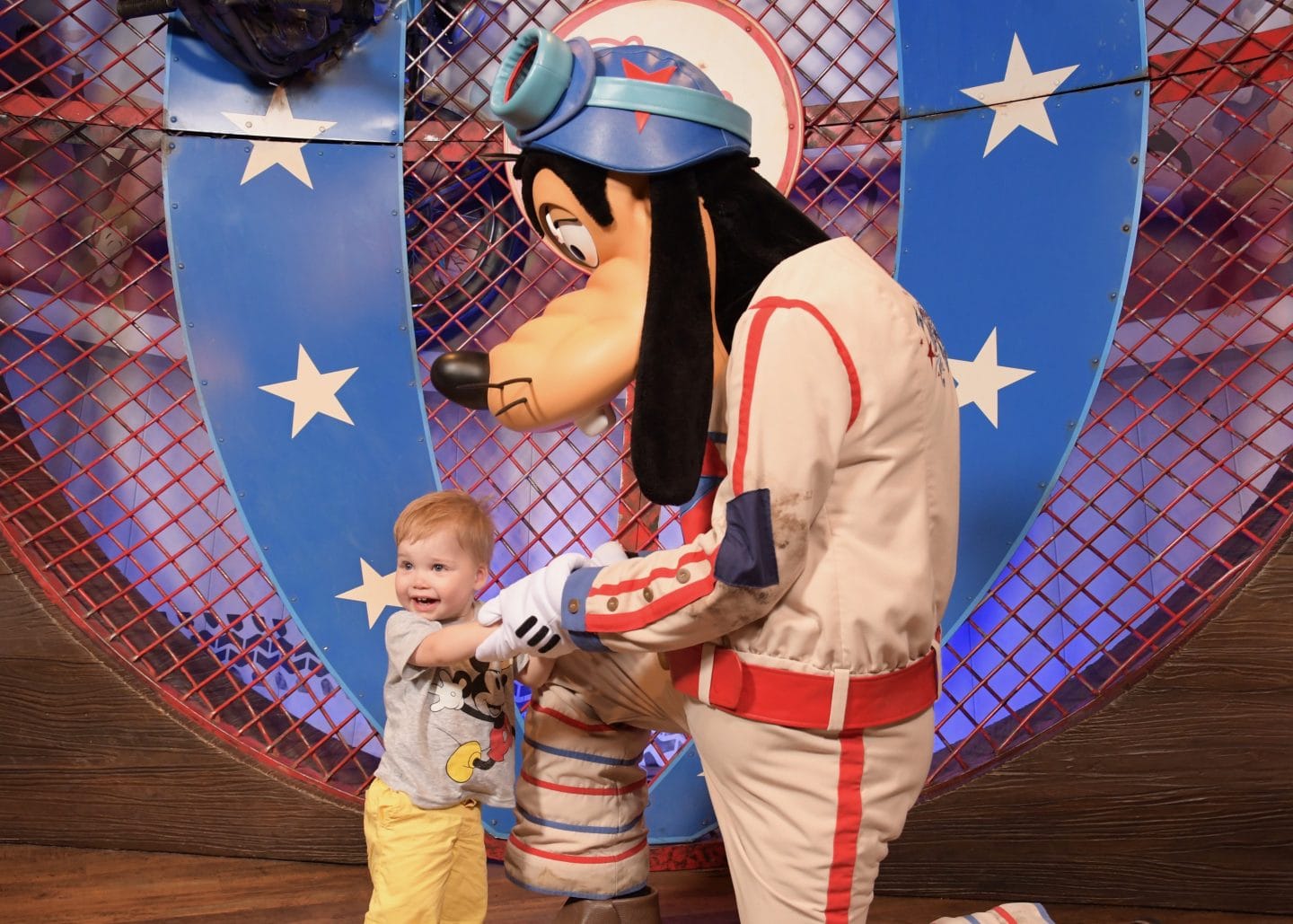 toddler boy with goofy at magic kingdom Disney World