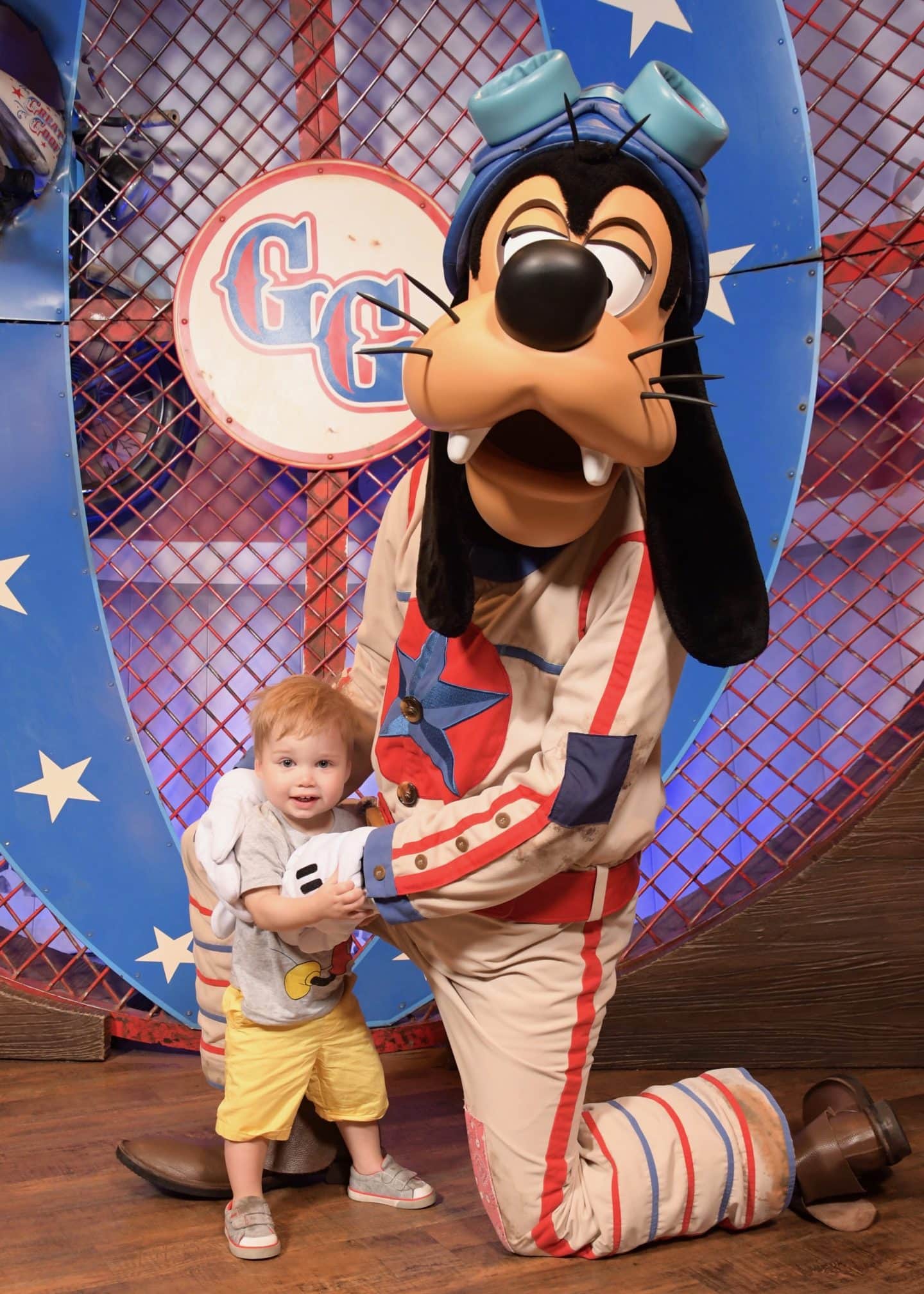 toddler boy with goofy at magic kingdom Disney World