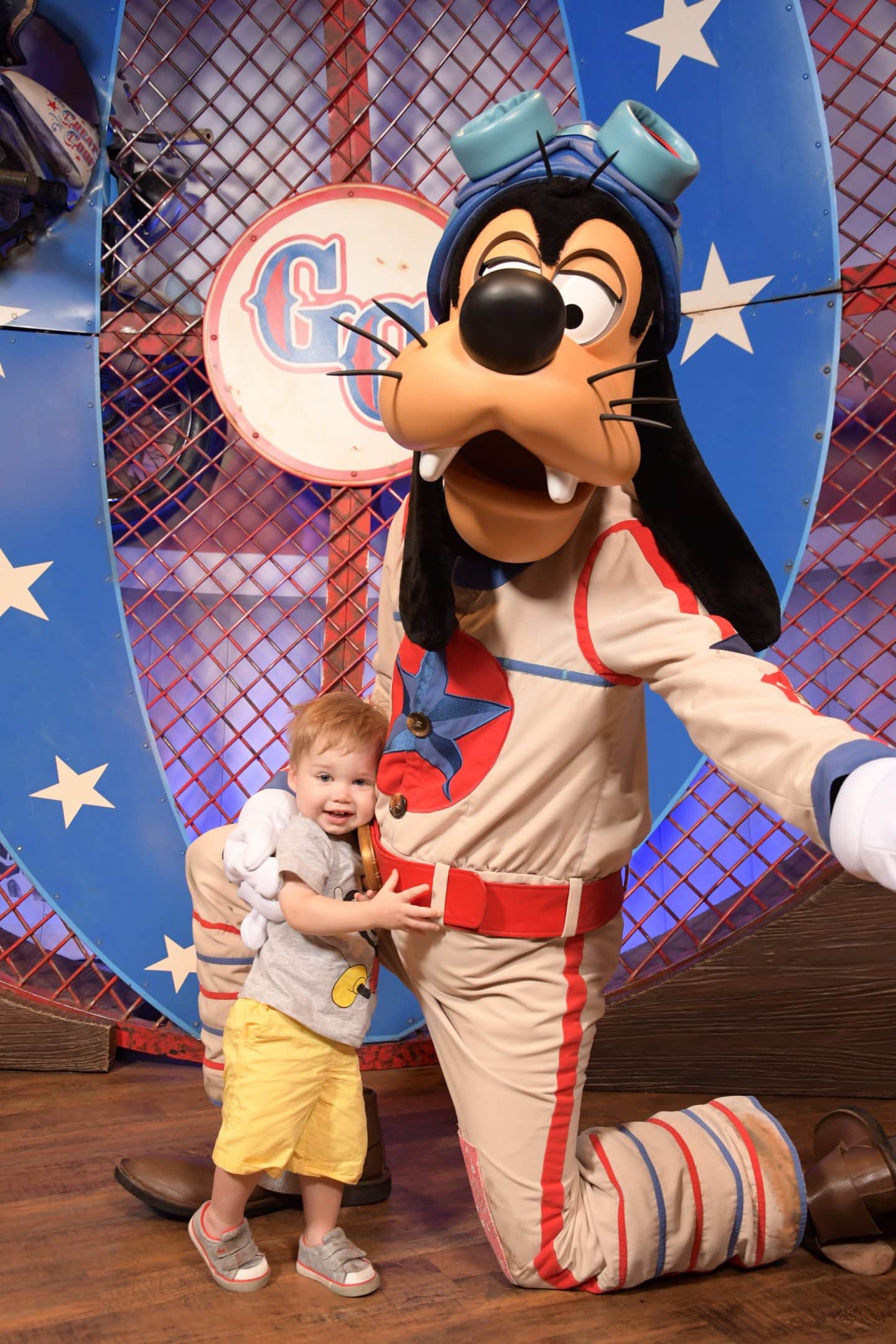 toddler boy with goofy at magic kingdom Disney World