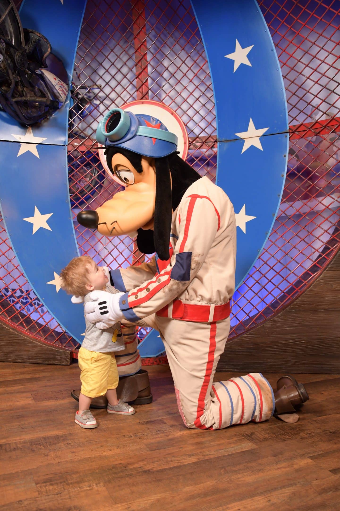 toddler boy with goofy at magic kingdom Disney World