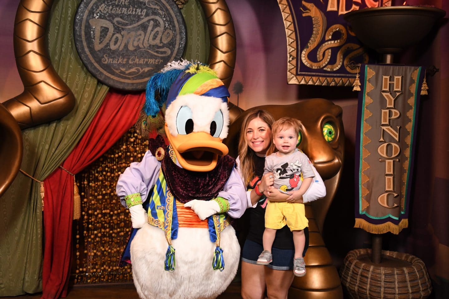 toddler boy meeting Donald Duck at magic kingdom Disney World