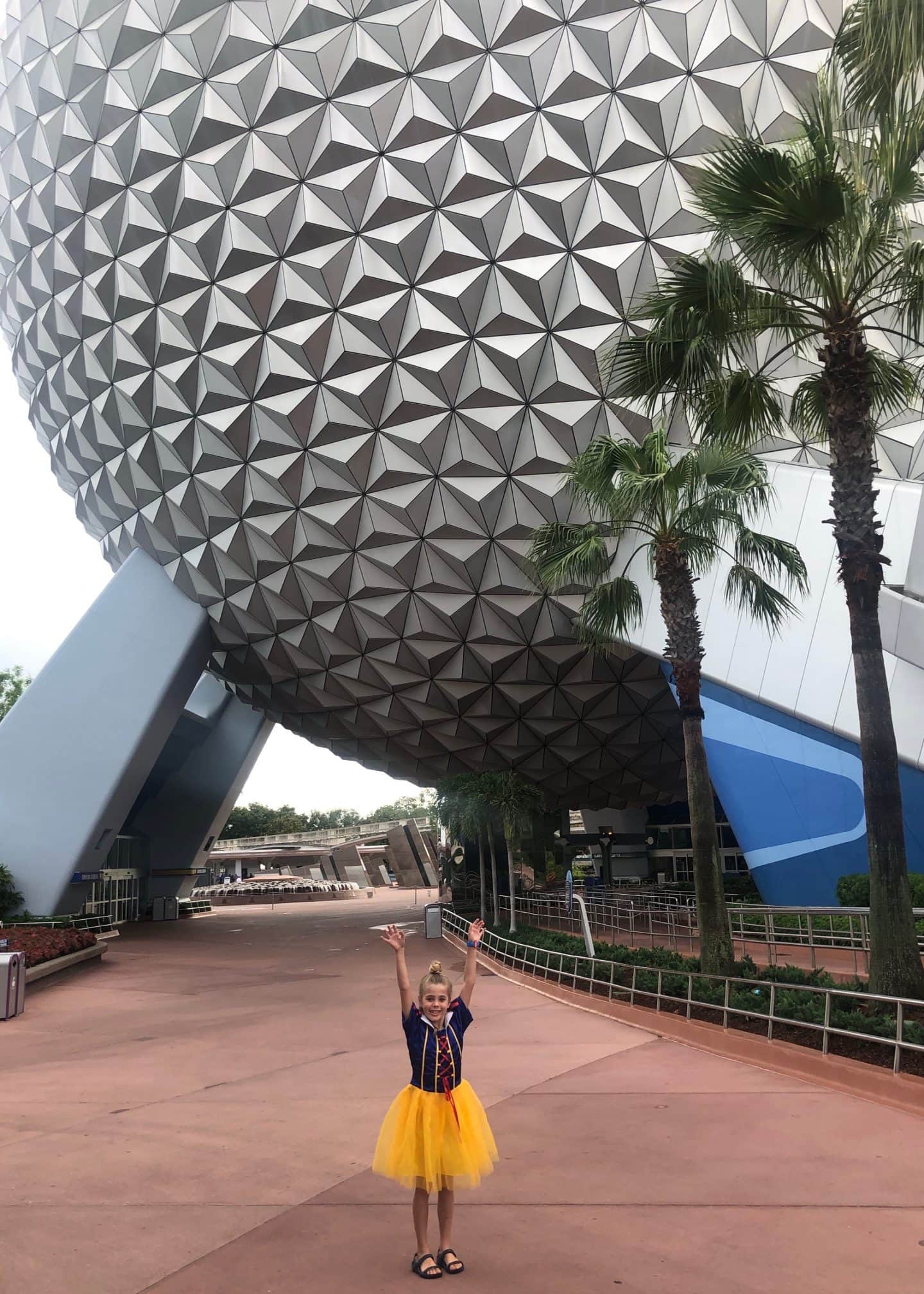 girls in princess dresses at Epcot