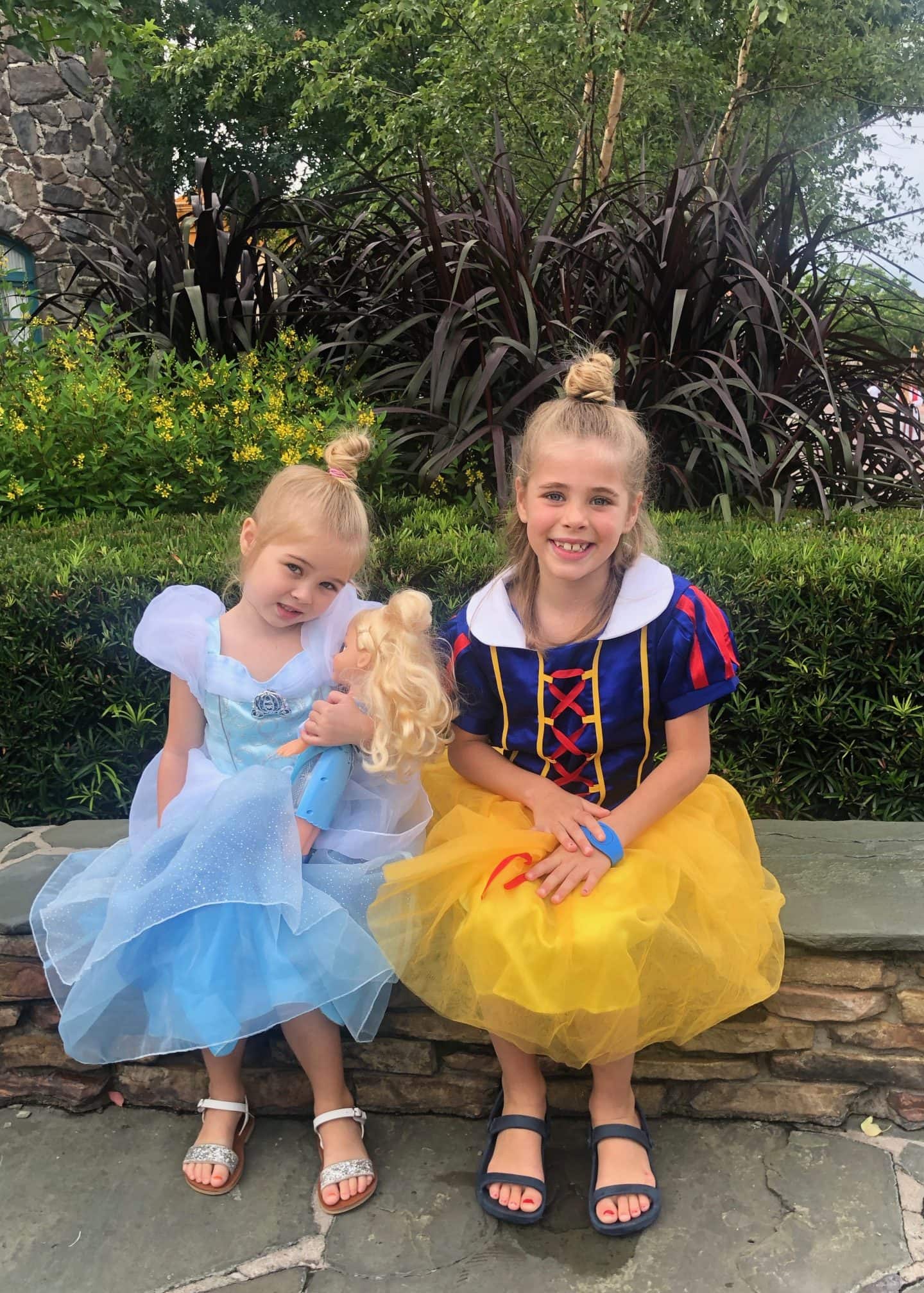 girls in princess dresses at Epcot