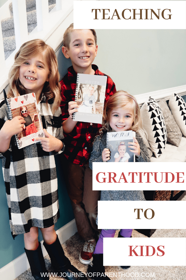 three kids holding a grateful journal - teaching appreciation in an entitled world 