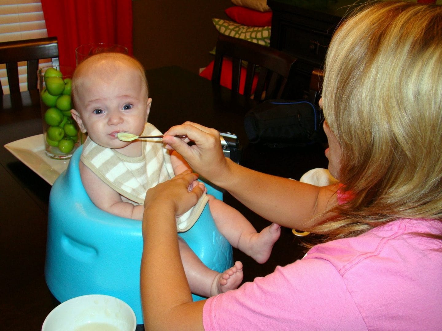 baby spoon feeding before mom learned about baby led weaning method