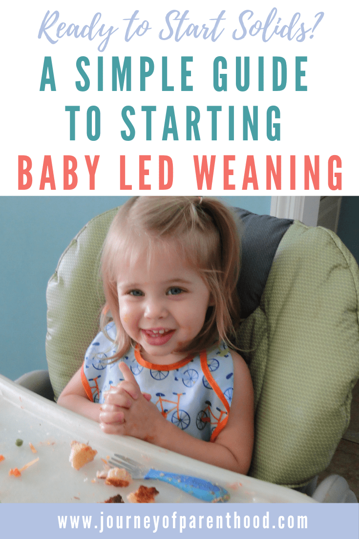 a simple guide to starting baby led weaning - baby sitting in high chair with solid food