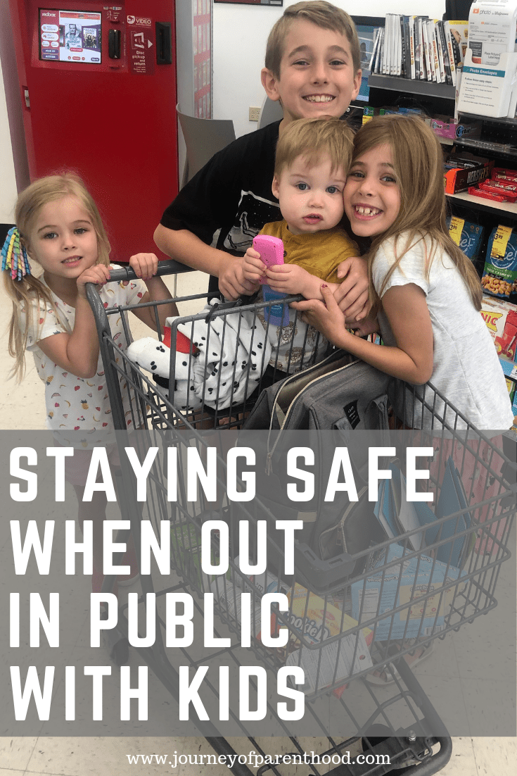 four children in shopping cart - staying safe when out in public with kids