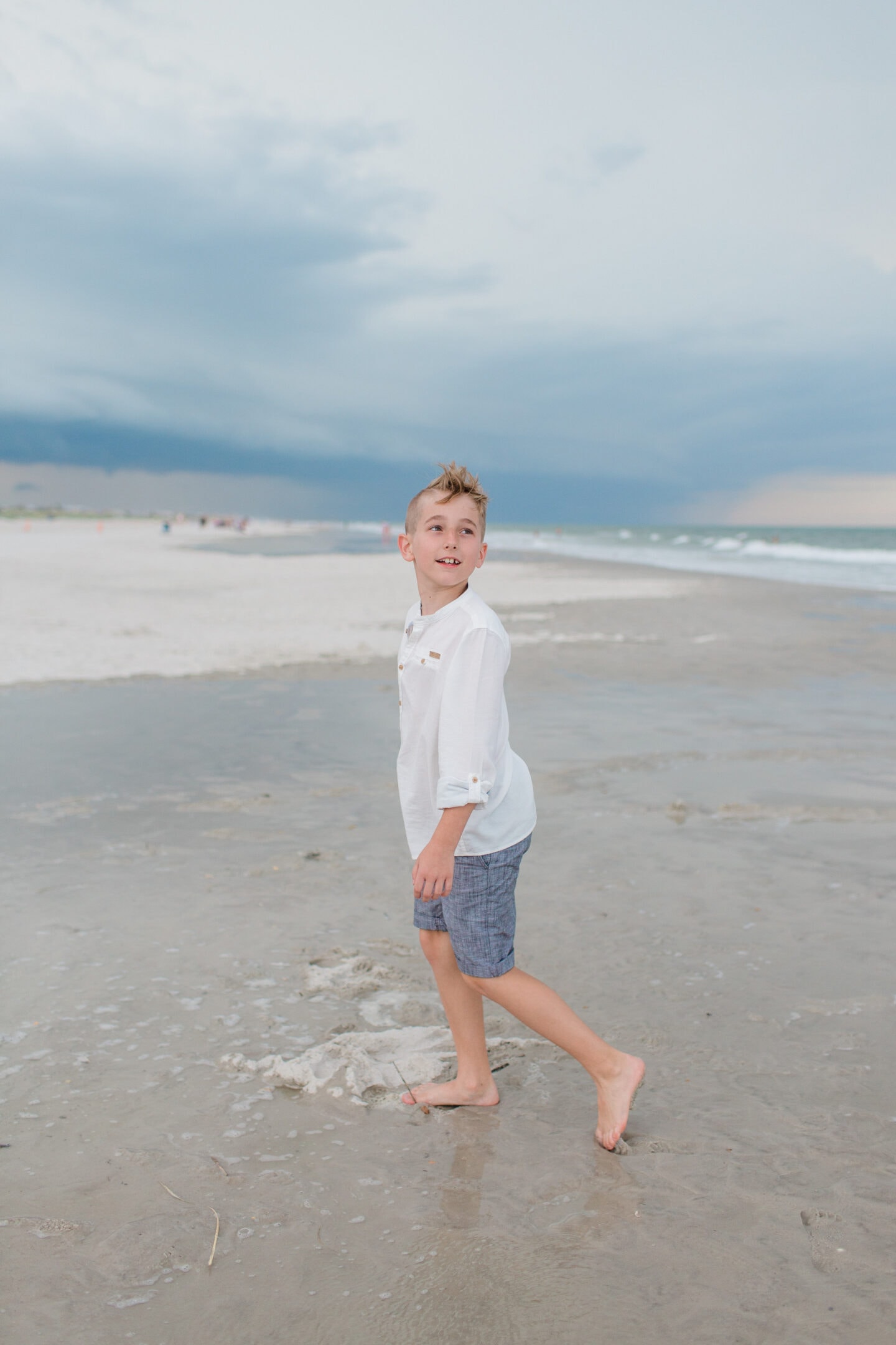 boy on beach by captured by Colson