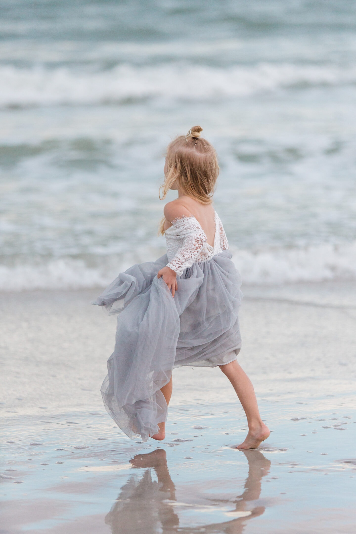 girl on beach by captured by Colson