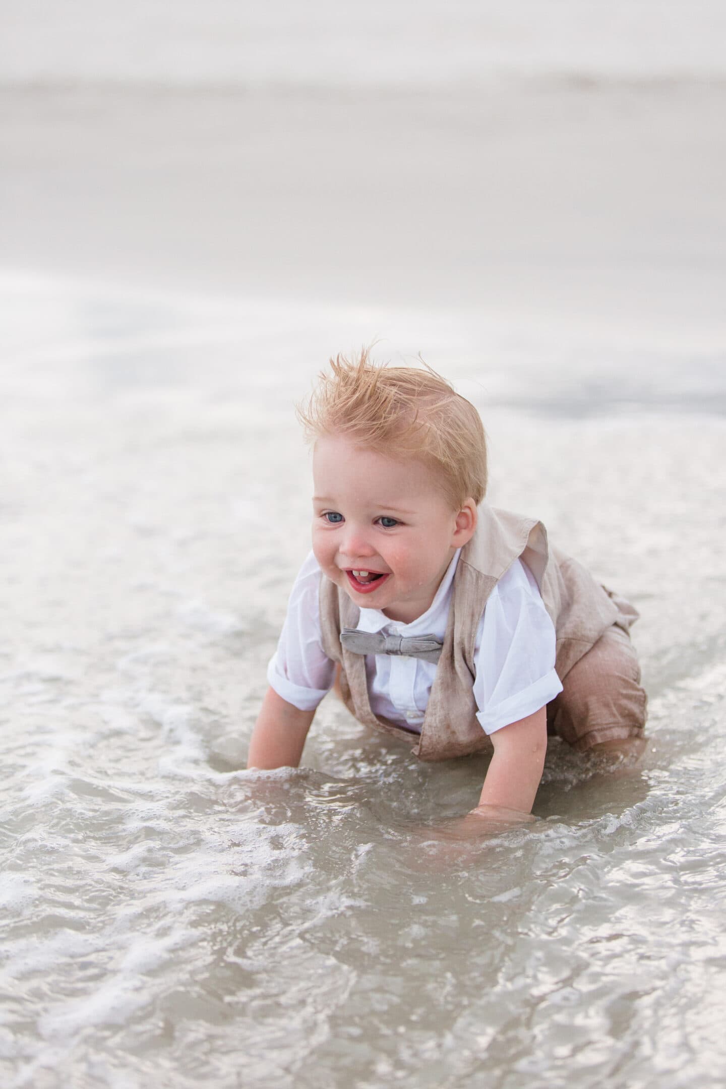 boy on beach by captured by Colson