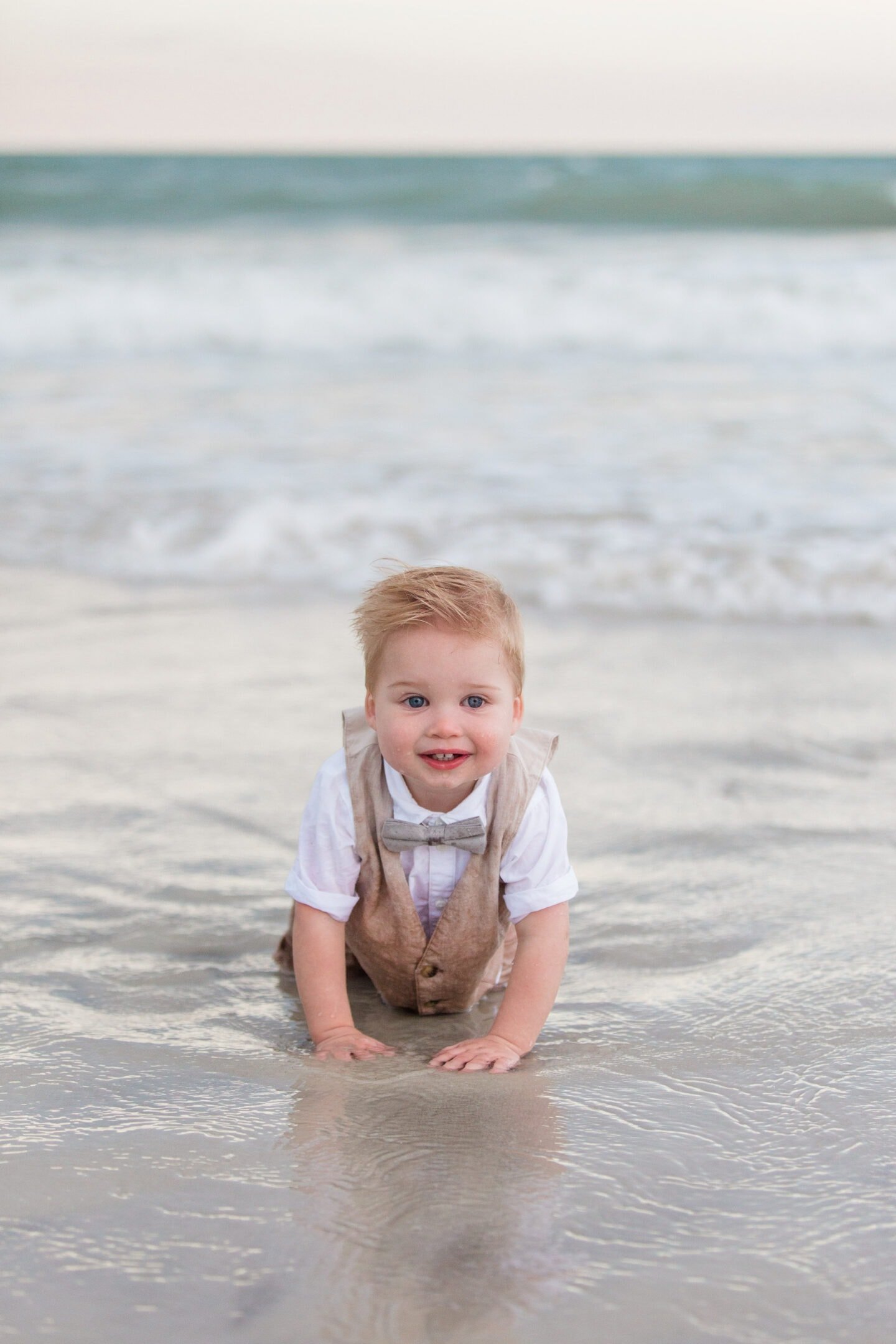 boy on beach by captured by Colson