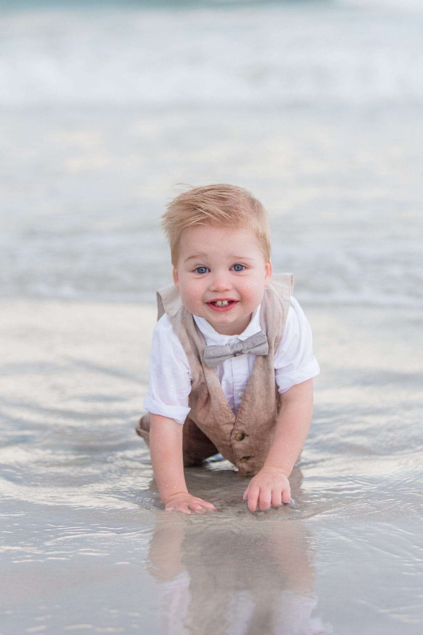 boy on beach by captured by Colson