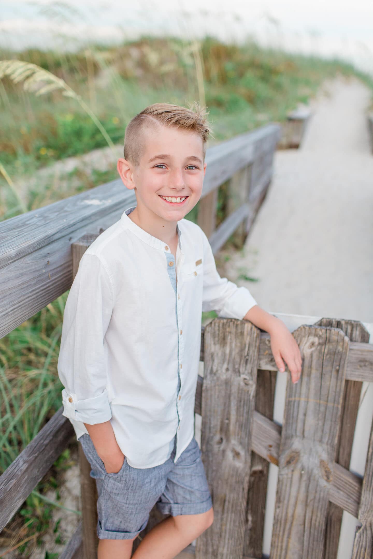 boy on beach by captured by Colson