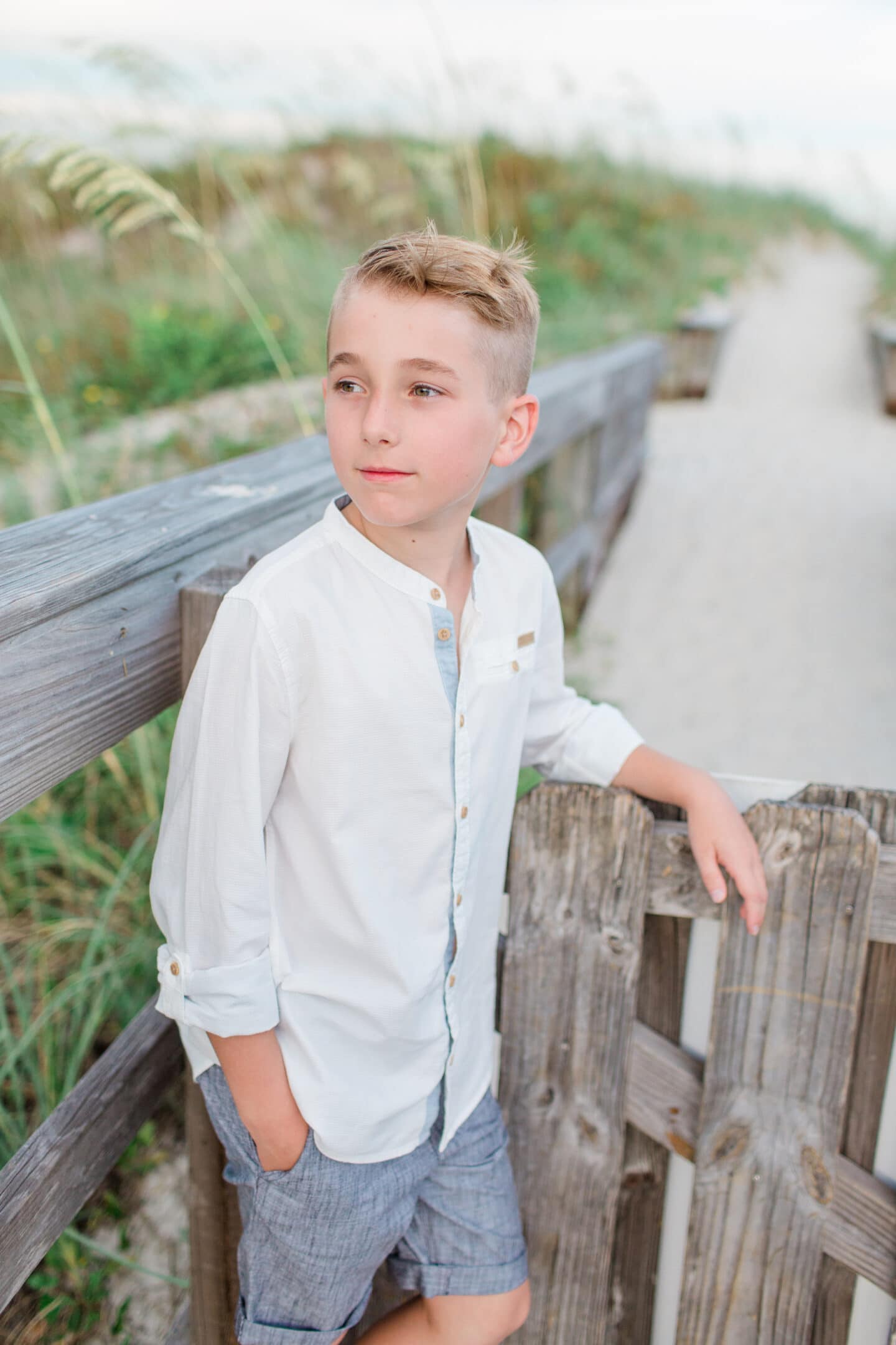 boy on beach by by captured by Colson