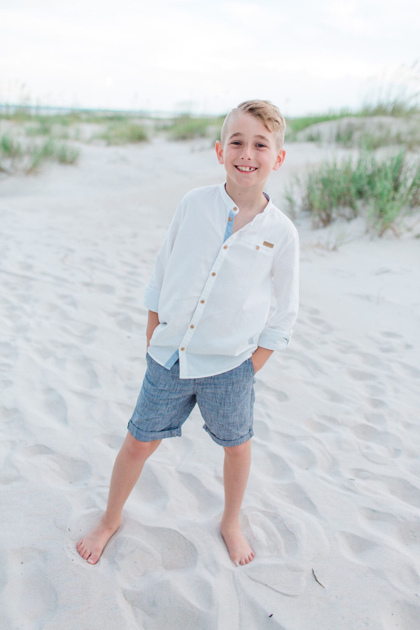 boy on beach by captured by Colson