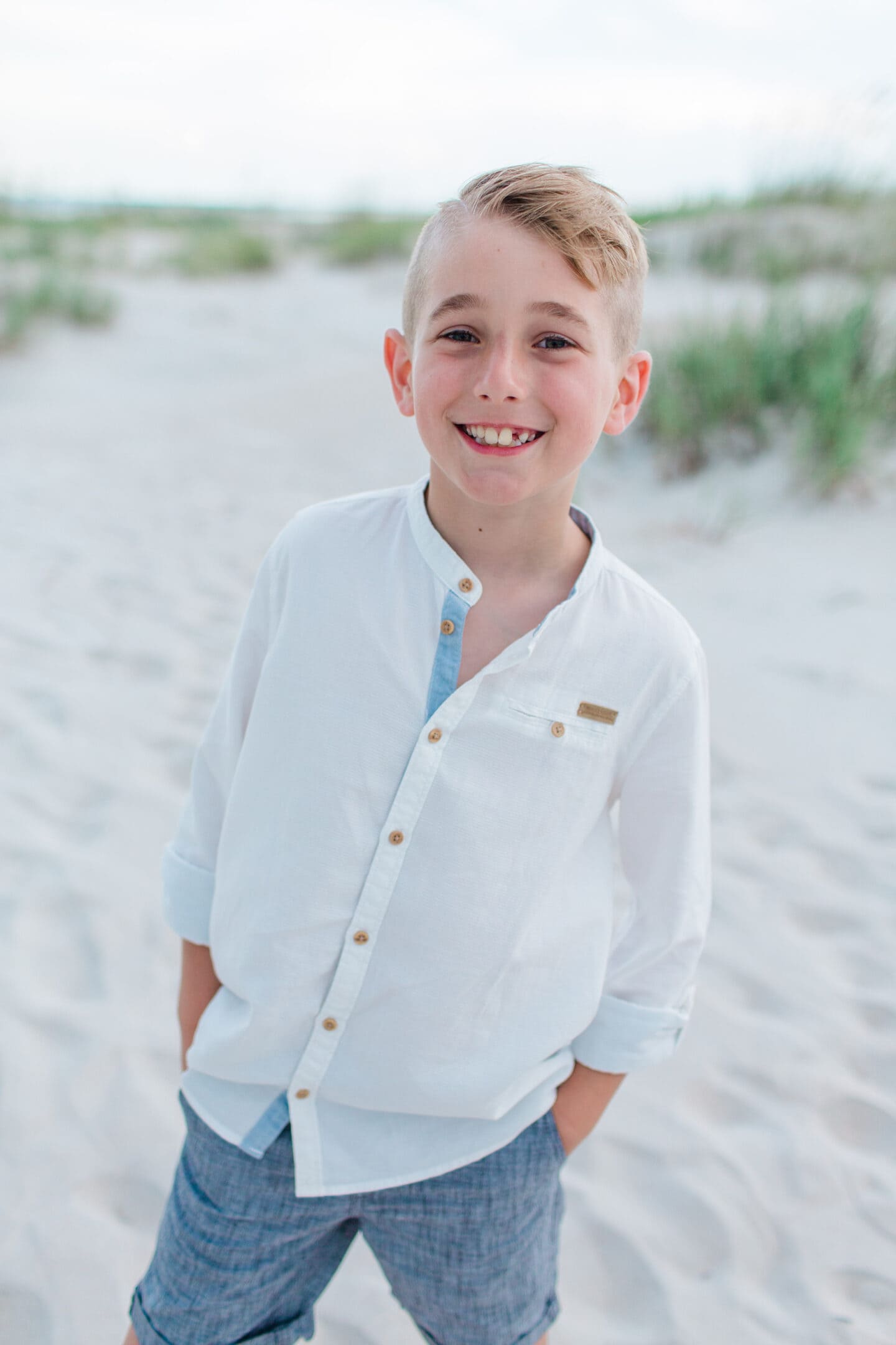 boy on beach by captured by Colson