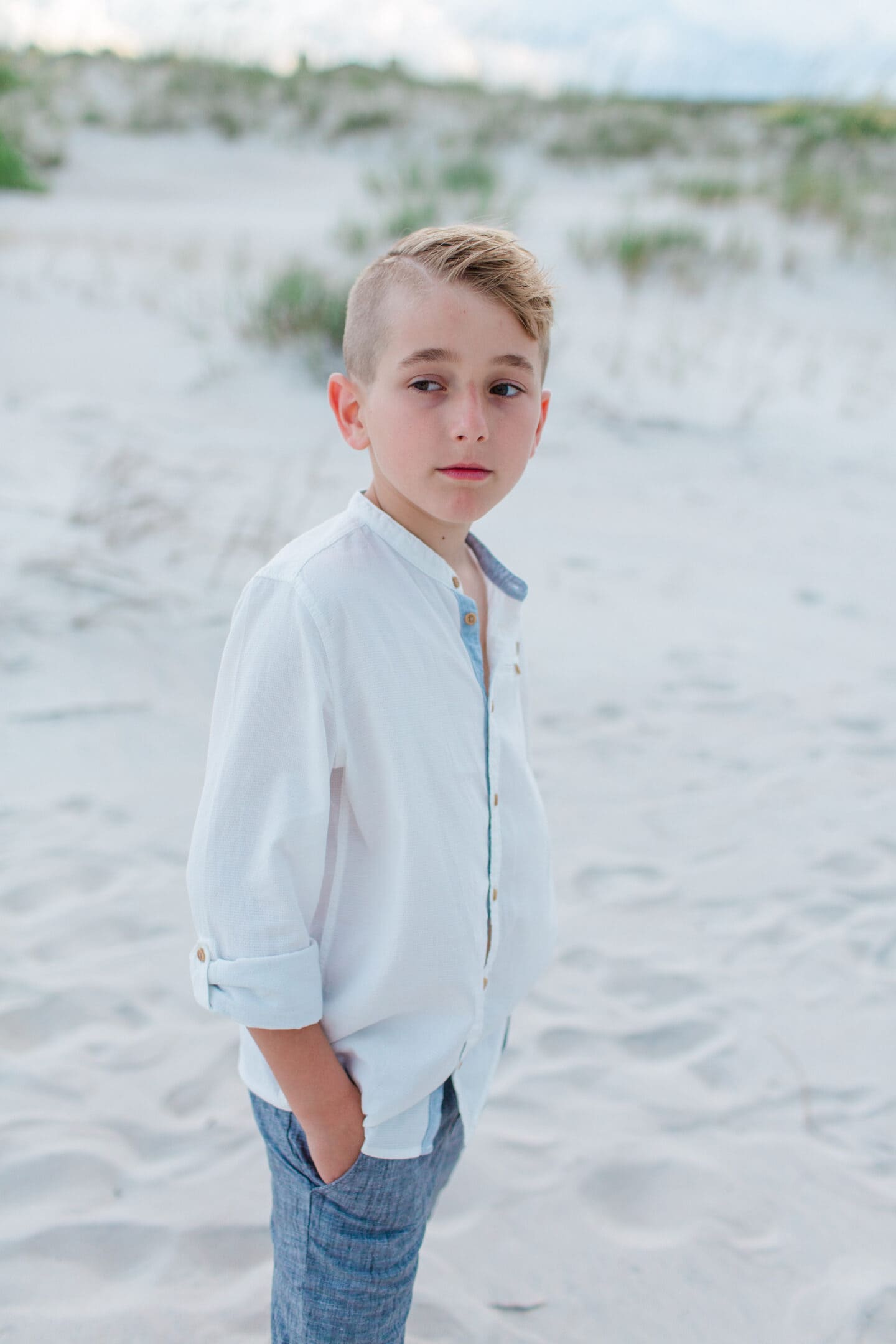 boy on beach by captured by Colson
