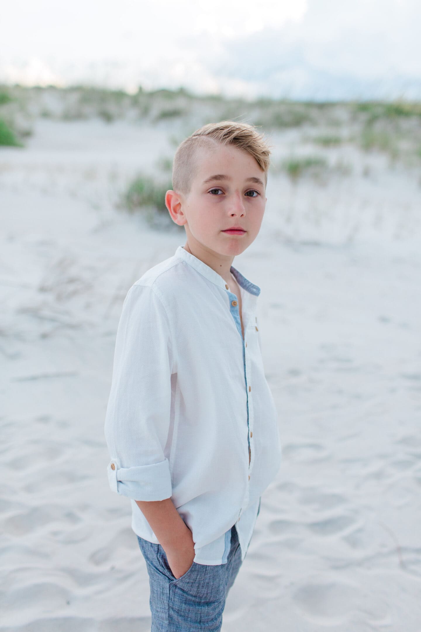 boy on beach by captured by Colson