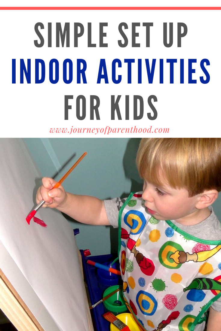 boy painting on easel rainy day indoor activities