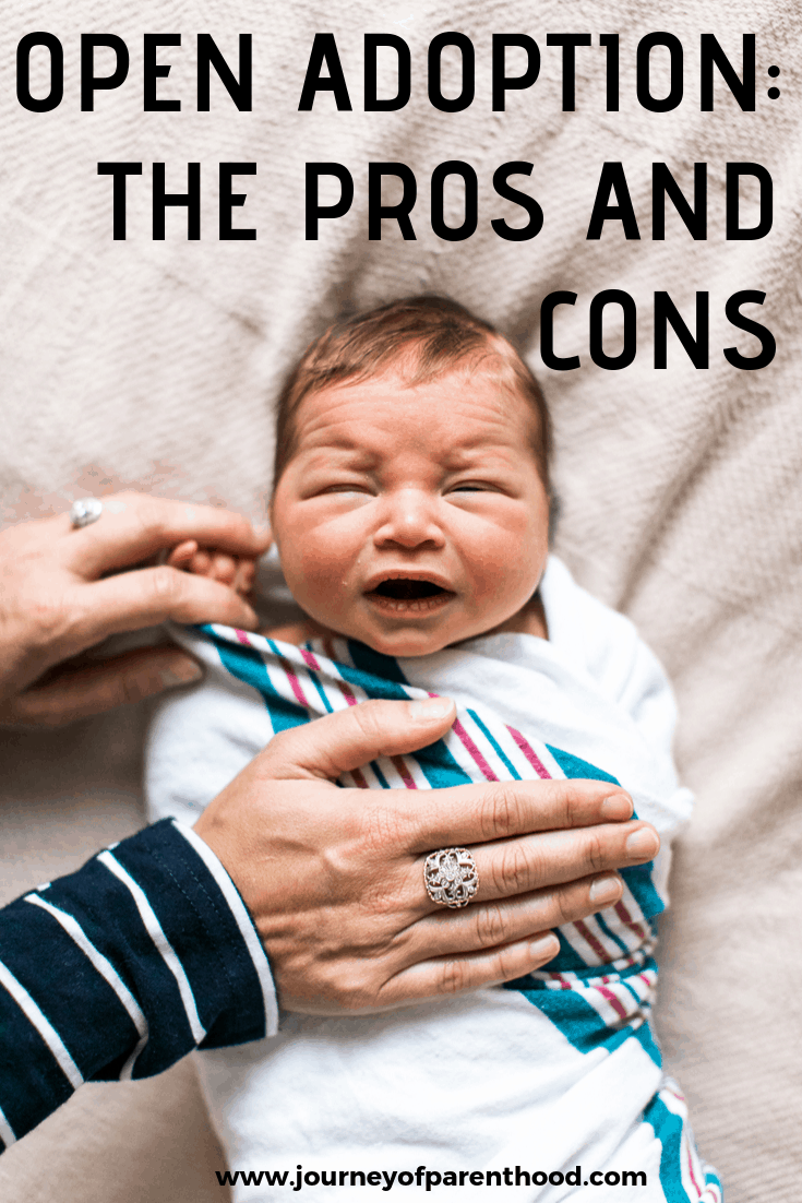 baby being comforted - open adoption the pros and cons