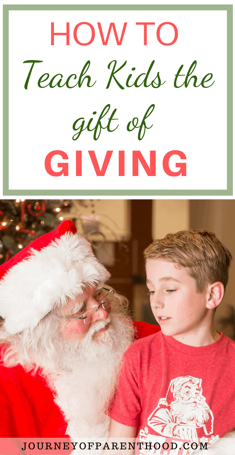 boy with santa - how to teach kids the gift of giving