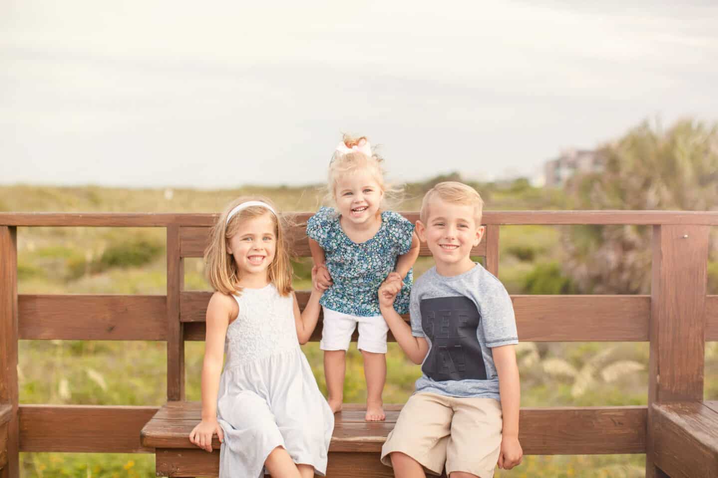 three kids at the beach family photos 