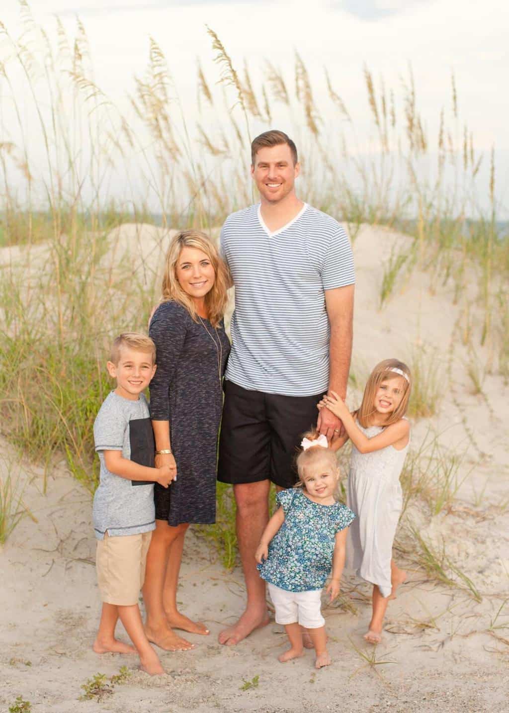 family photos at the beach as a family of five. Posing ideas and outfit inspirations 