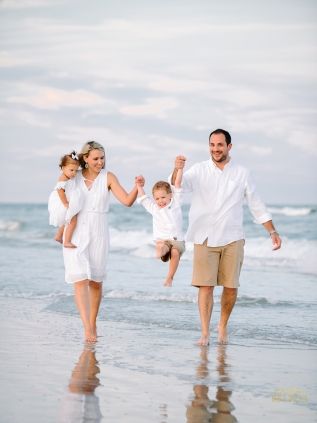 playing at beach during family beach photo session