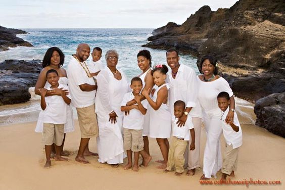 family photos at beach wearing white