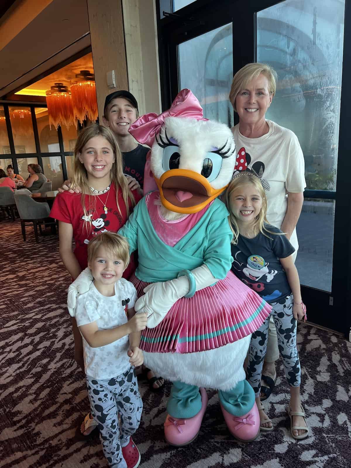 A family review of Topolino's Character Breakfast at Disney World and how to get a reservation at Topolino's Terrace Character Breakfast!