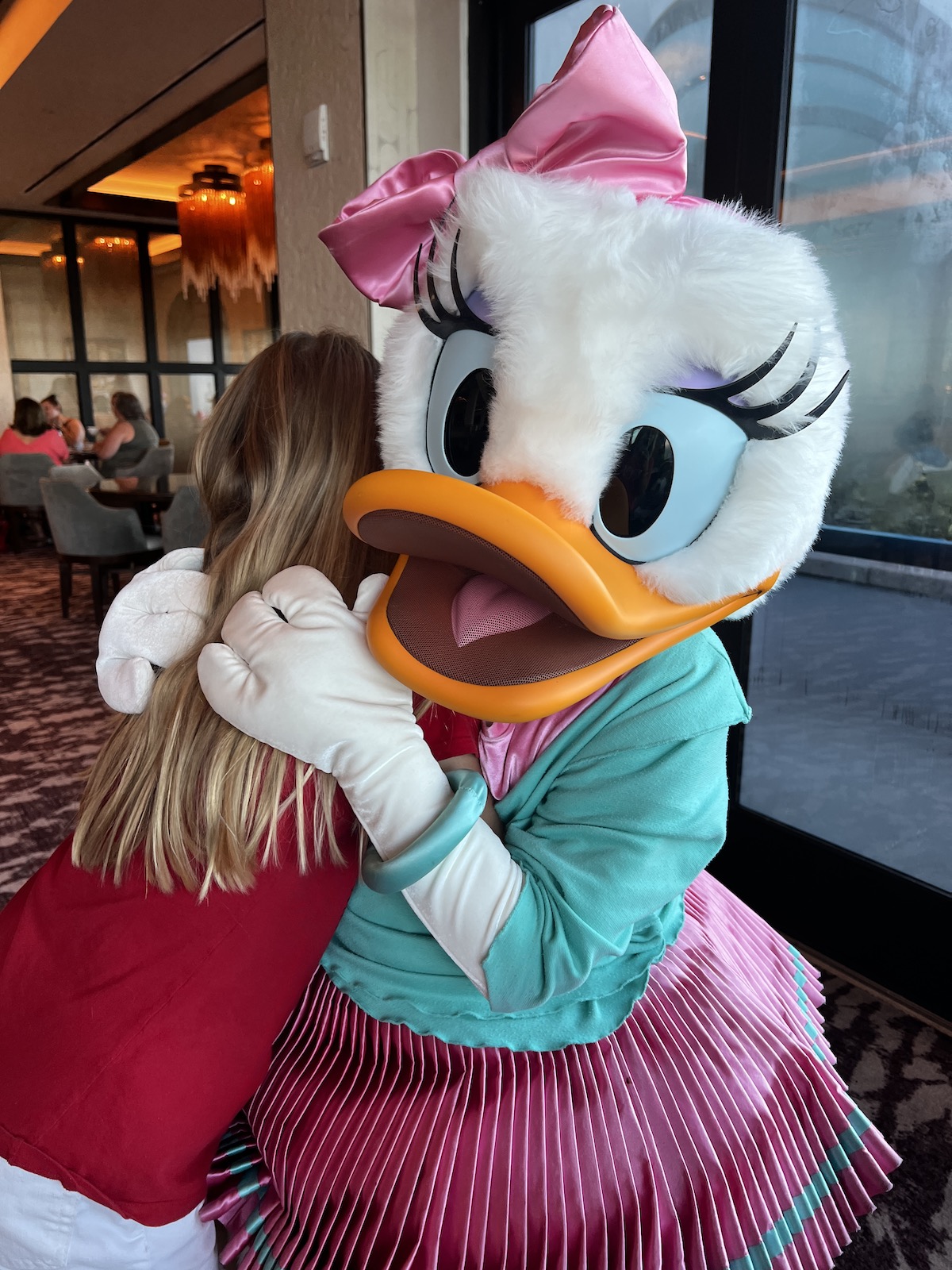 hugging daisy at disney world