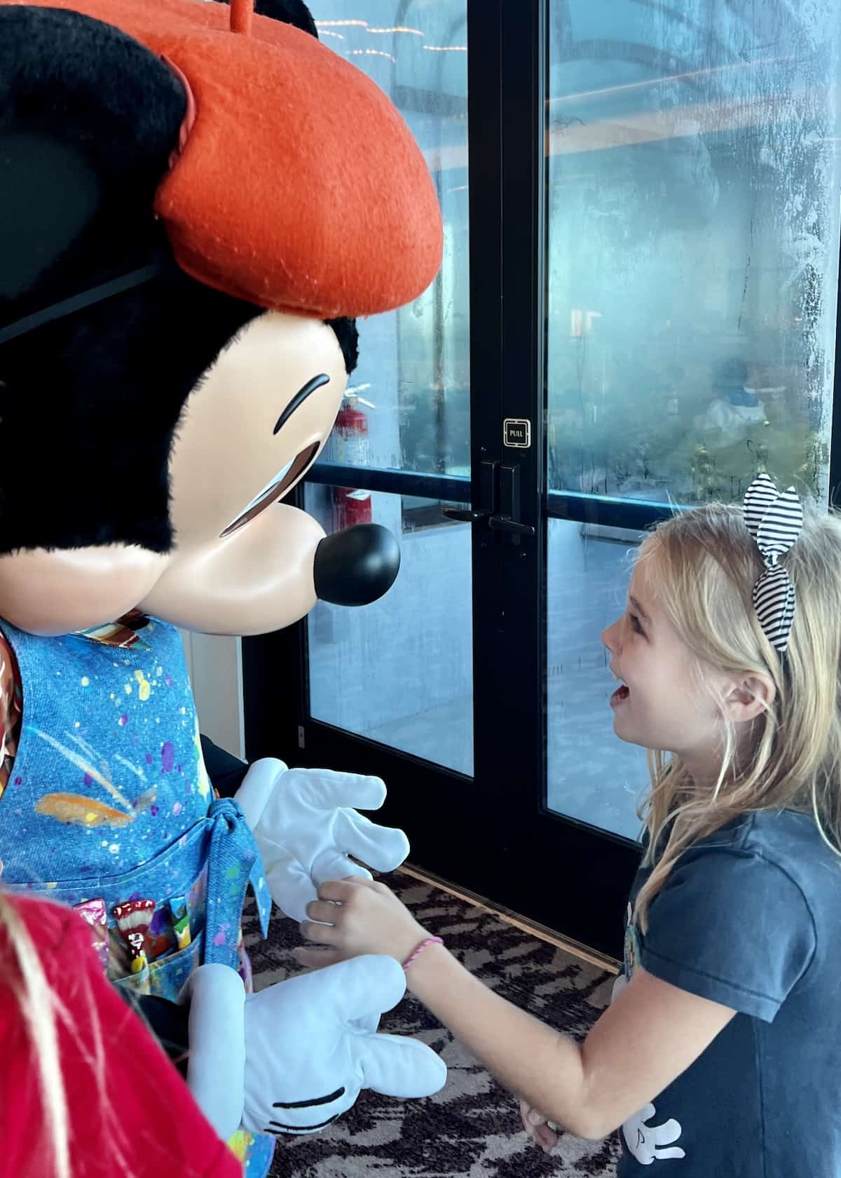 meeting mickey at character breakfast 